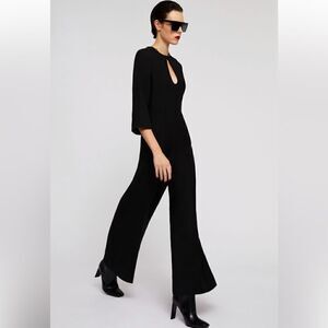 Gucci
Black jumpsuit  🔴